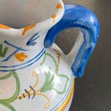 White and blue earthenware milk pitcher