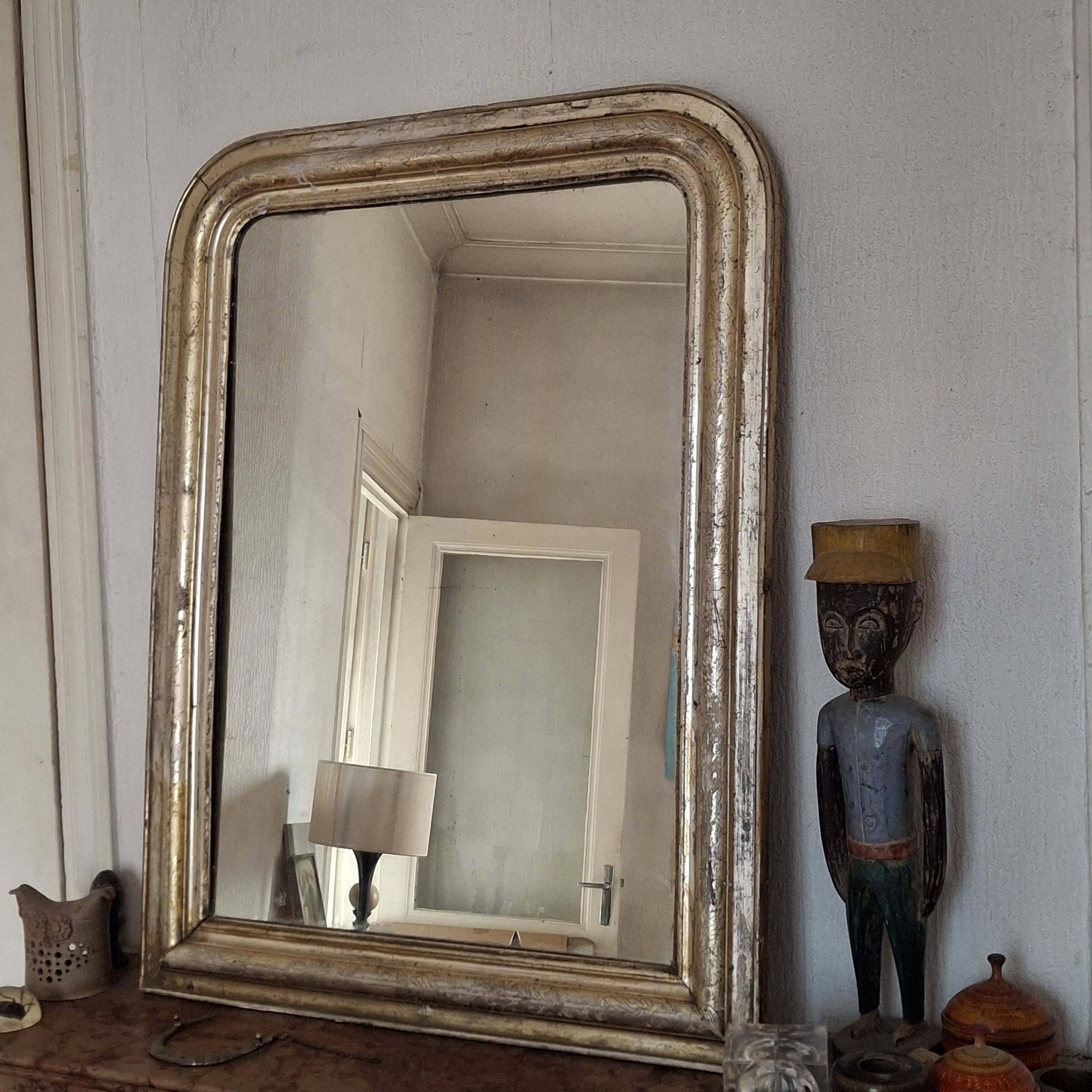 Antique Louis Philippe silvered mirror.