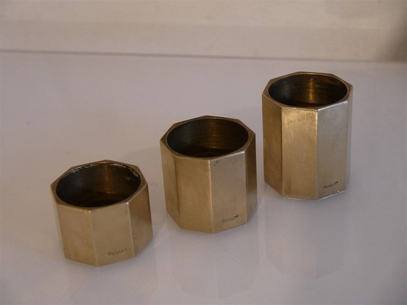 Set of 3 Swedish brass candlesticks