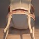 Louis XV style armchair upholstered with an Egyptian pattern.