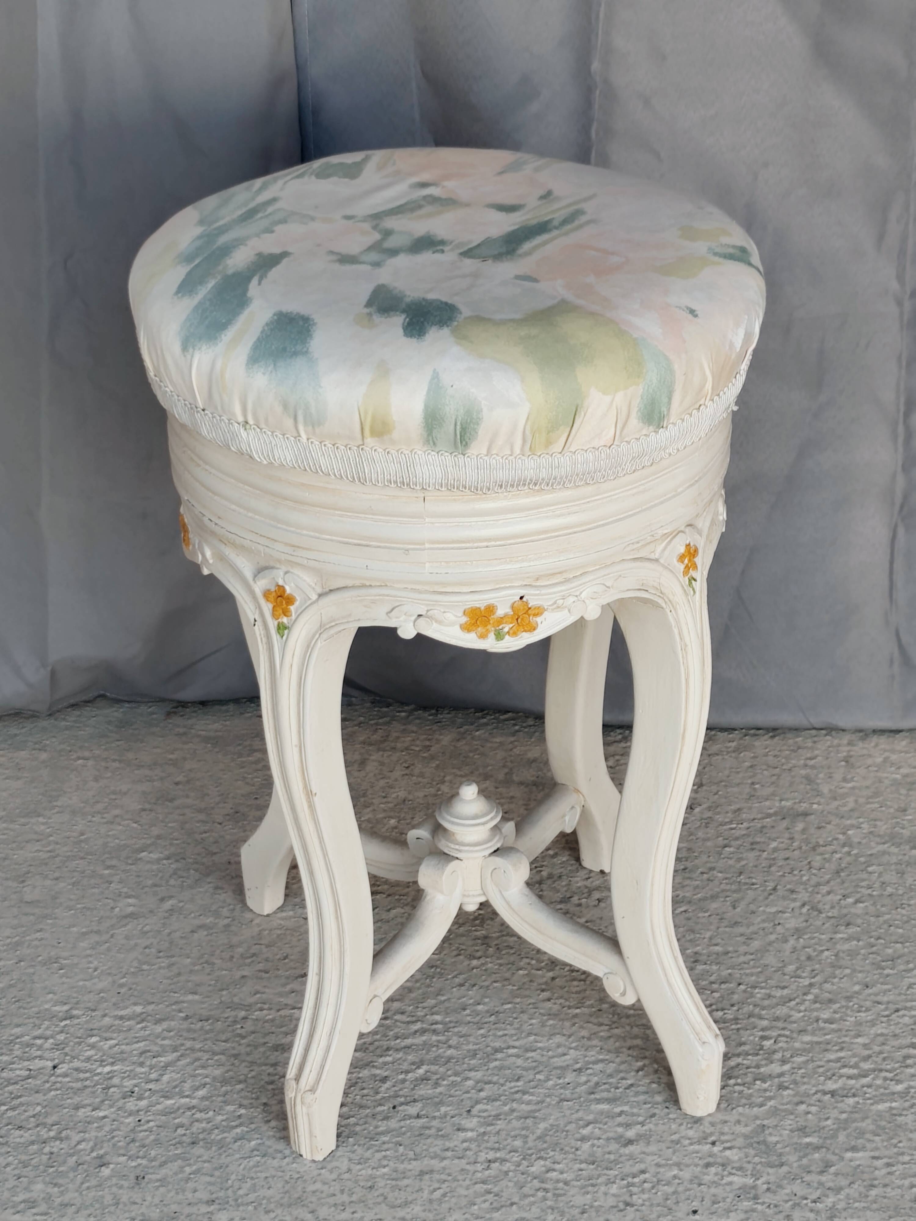 Antique upholstered stool "with screws"