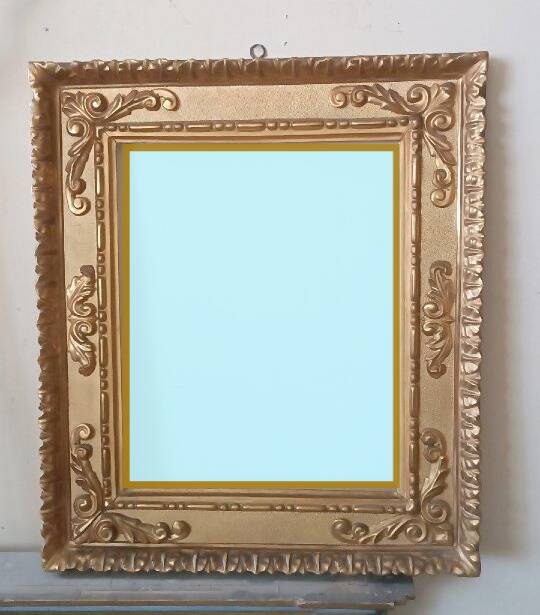 Miroir ancien en bois doré