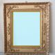 Miroir ancien en bois doré