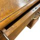 Vintage American desk made of solid wood with a curtain.