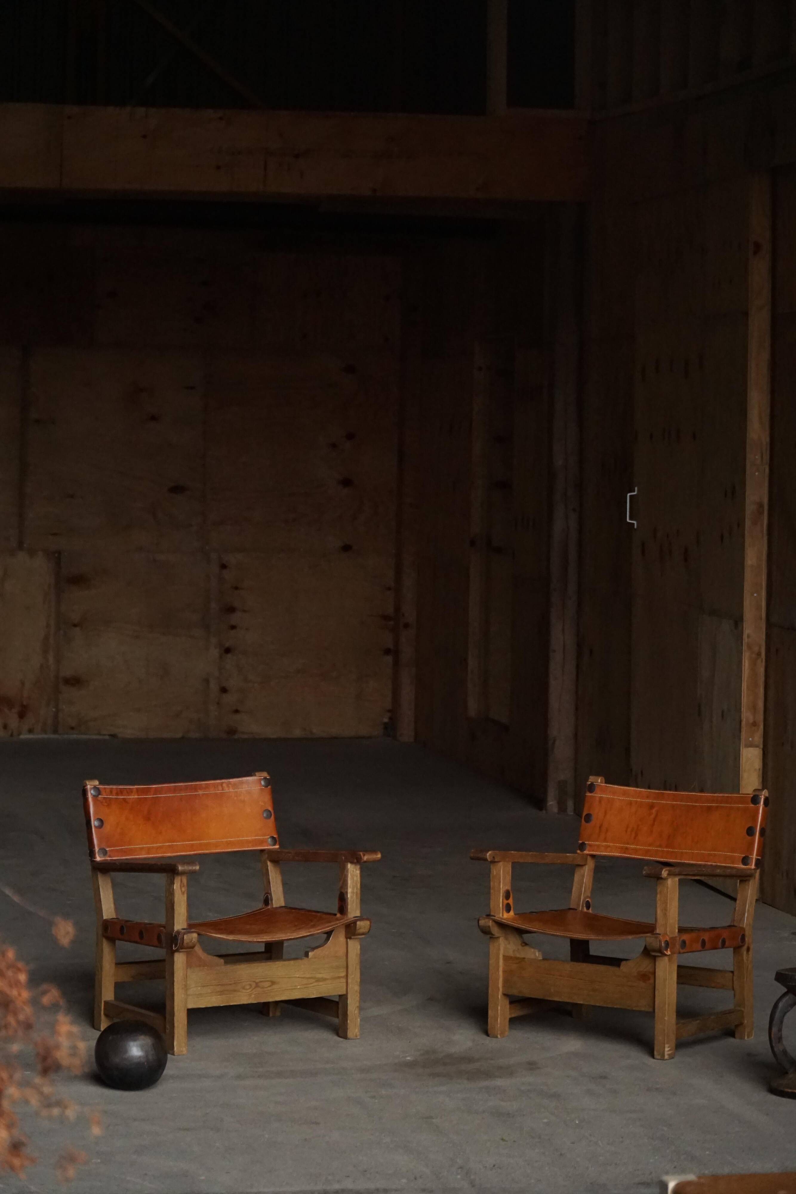 Pair of Spanish brutalist armchairs from the 1960s, wood and leather.