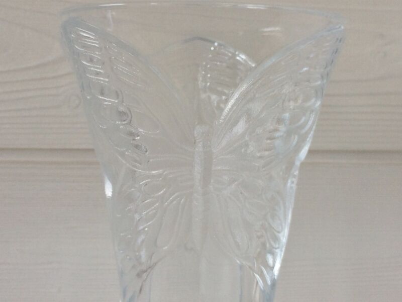 Ancient crystal vase butterfly motif