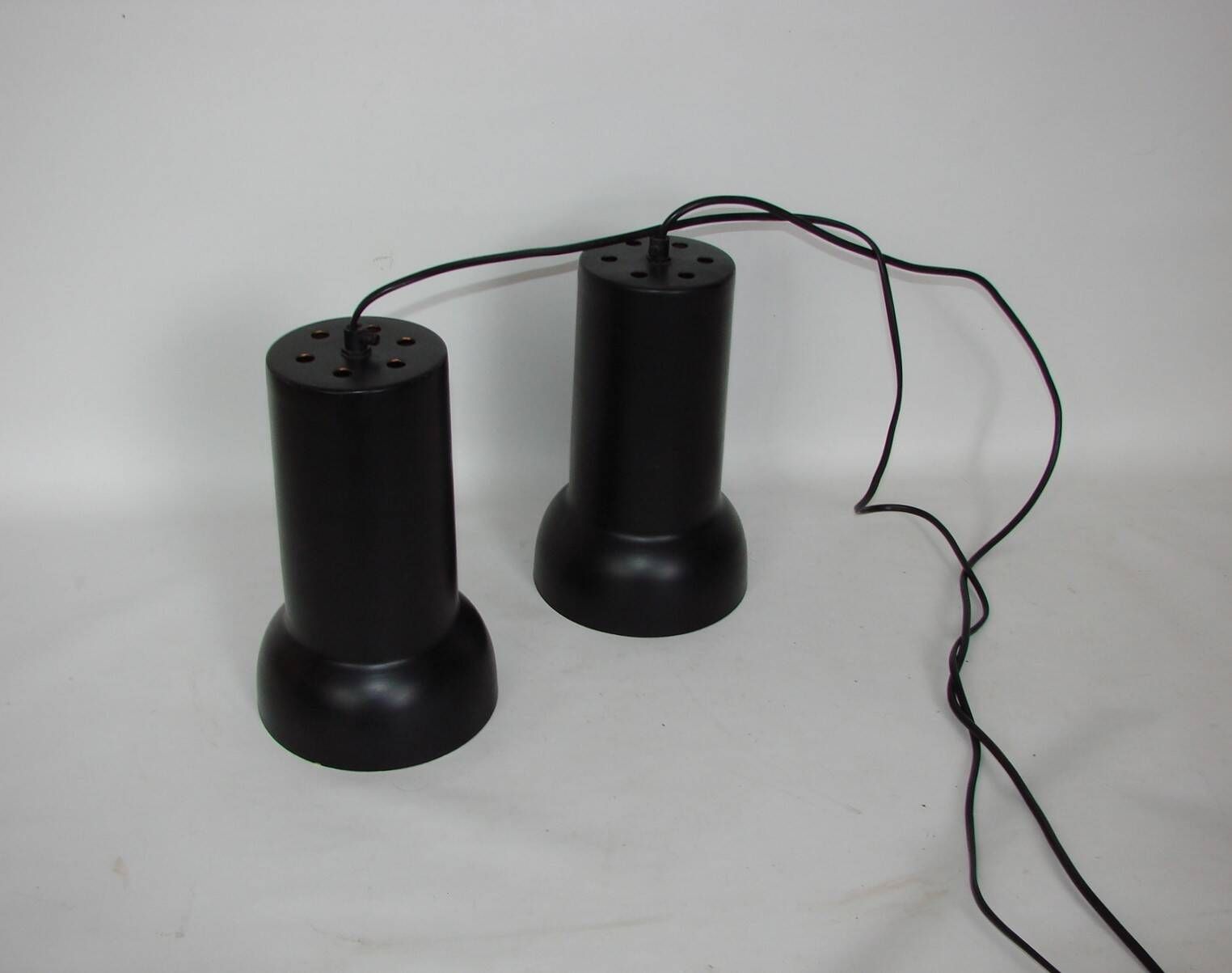 A pair of vintage pendant lights – black brass, modernist