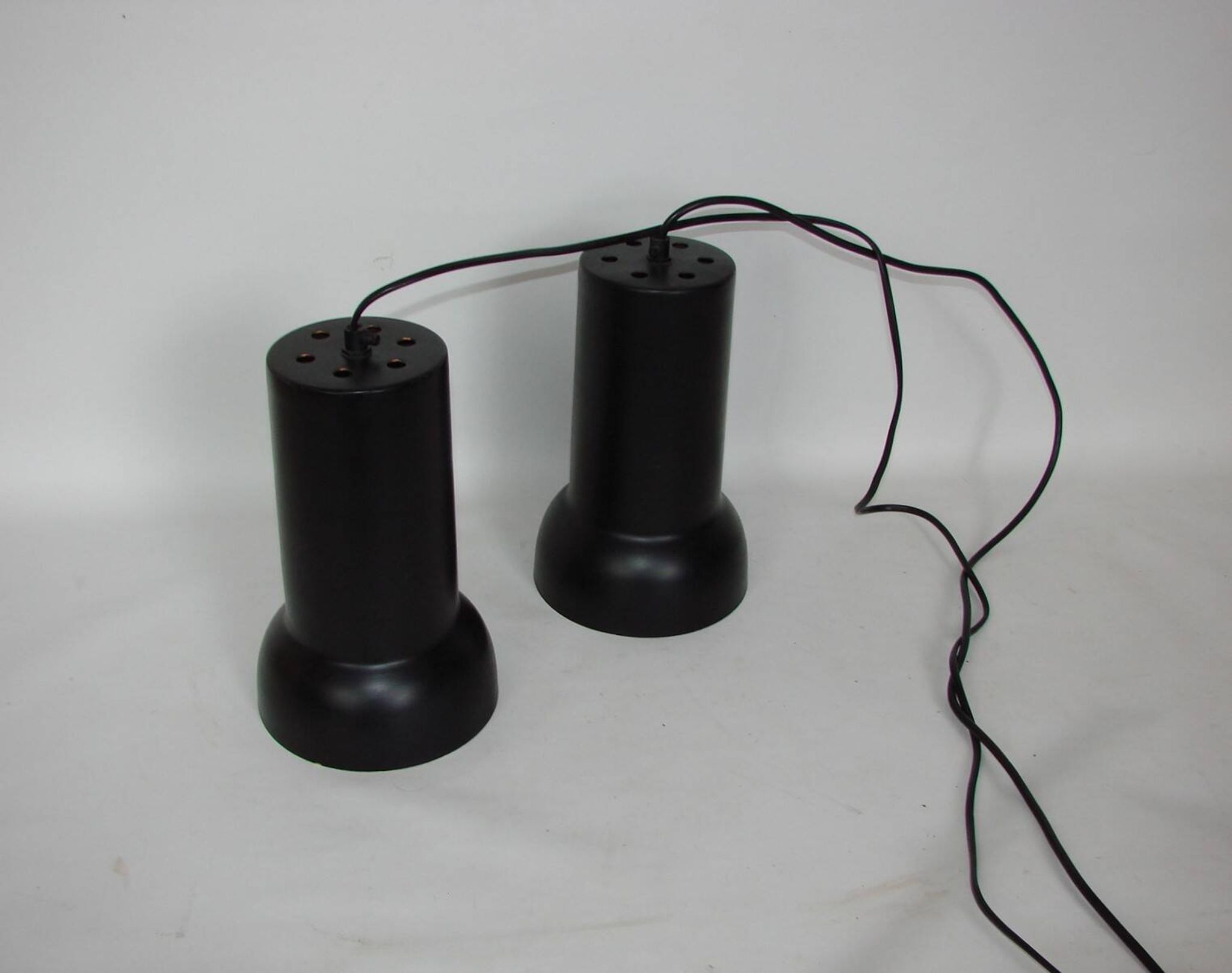 A pair of vintage pendant lights – black brass, modernist