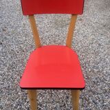 Eight wooden and formica chairs