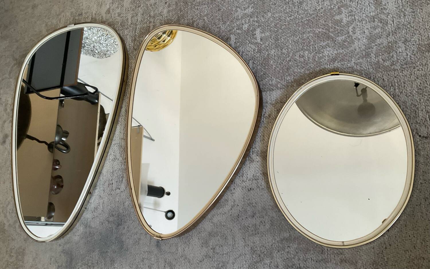 Trio of asymmetrical free-form mirrors from the 60s and 70s