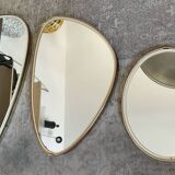 Trio of asymmetrical free-form mirrors from the 60s and 70s