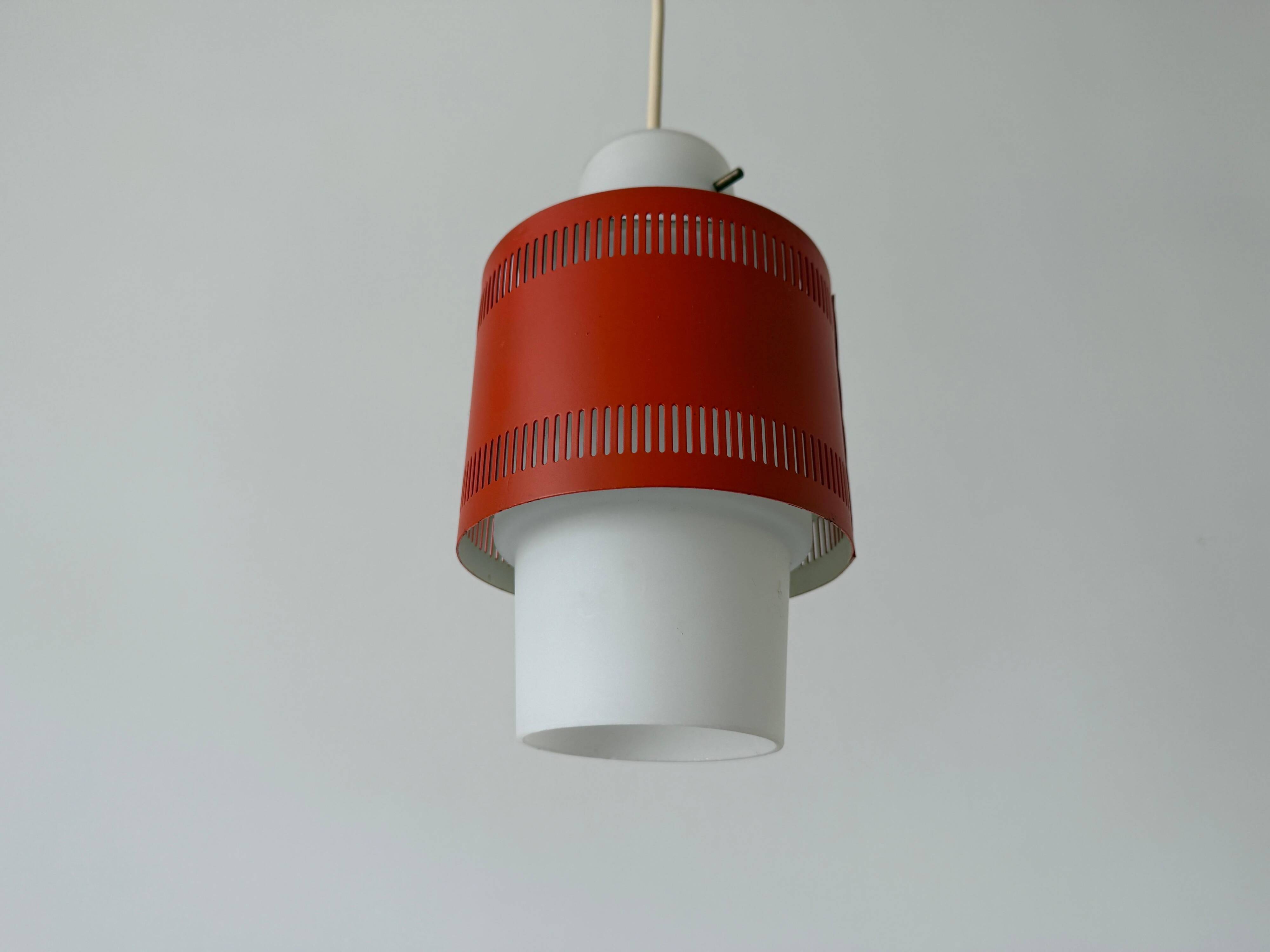 Glass ceiling light with an orange metal frame, 1960s, Germany.