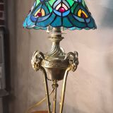 bronze lamp with a goat's head from the 19th century and a stained glass lampshade soldered with lead