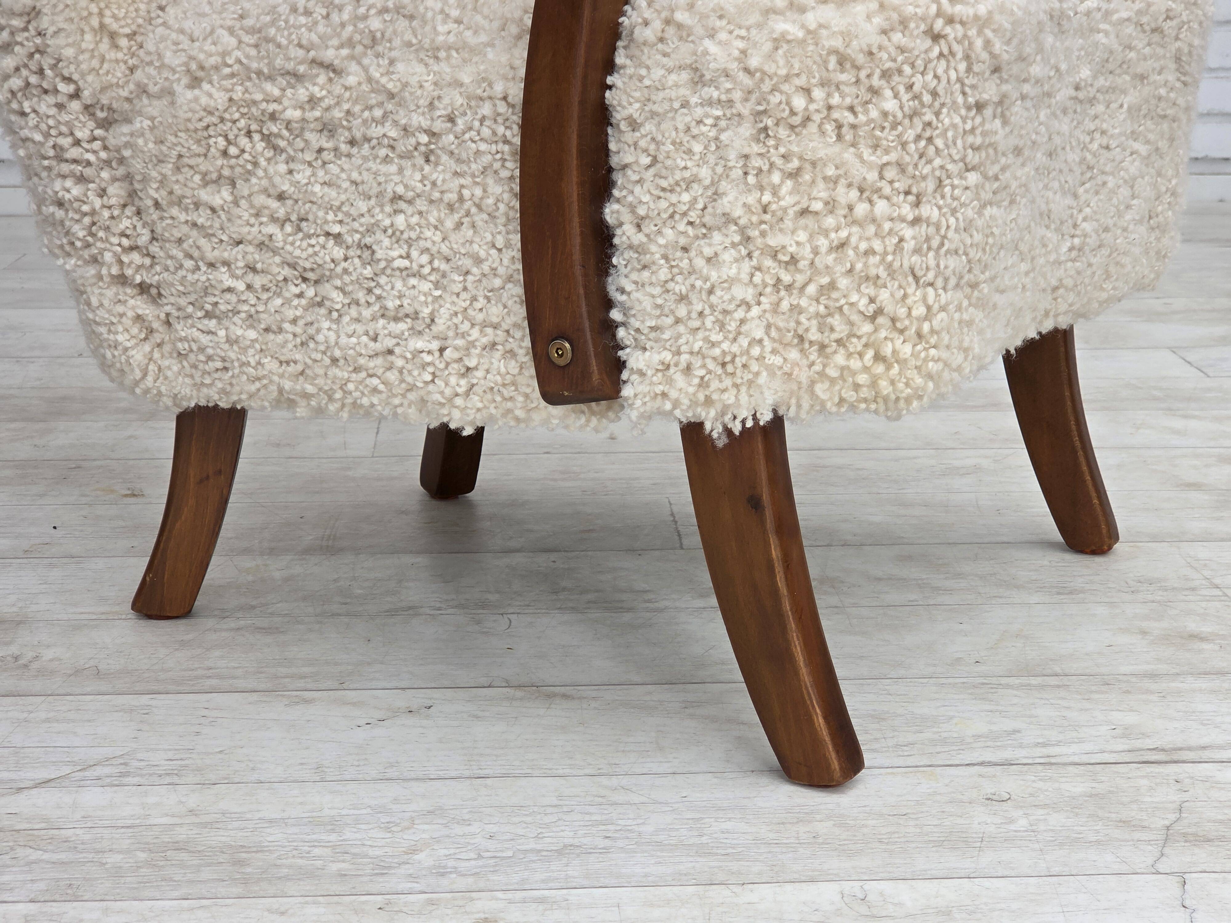 1960s, Danish design by Alfred Christensen, reupholstered, sheepskin.