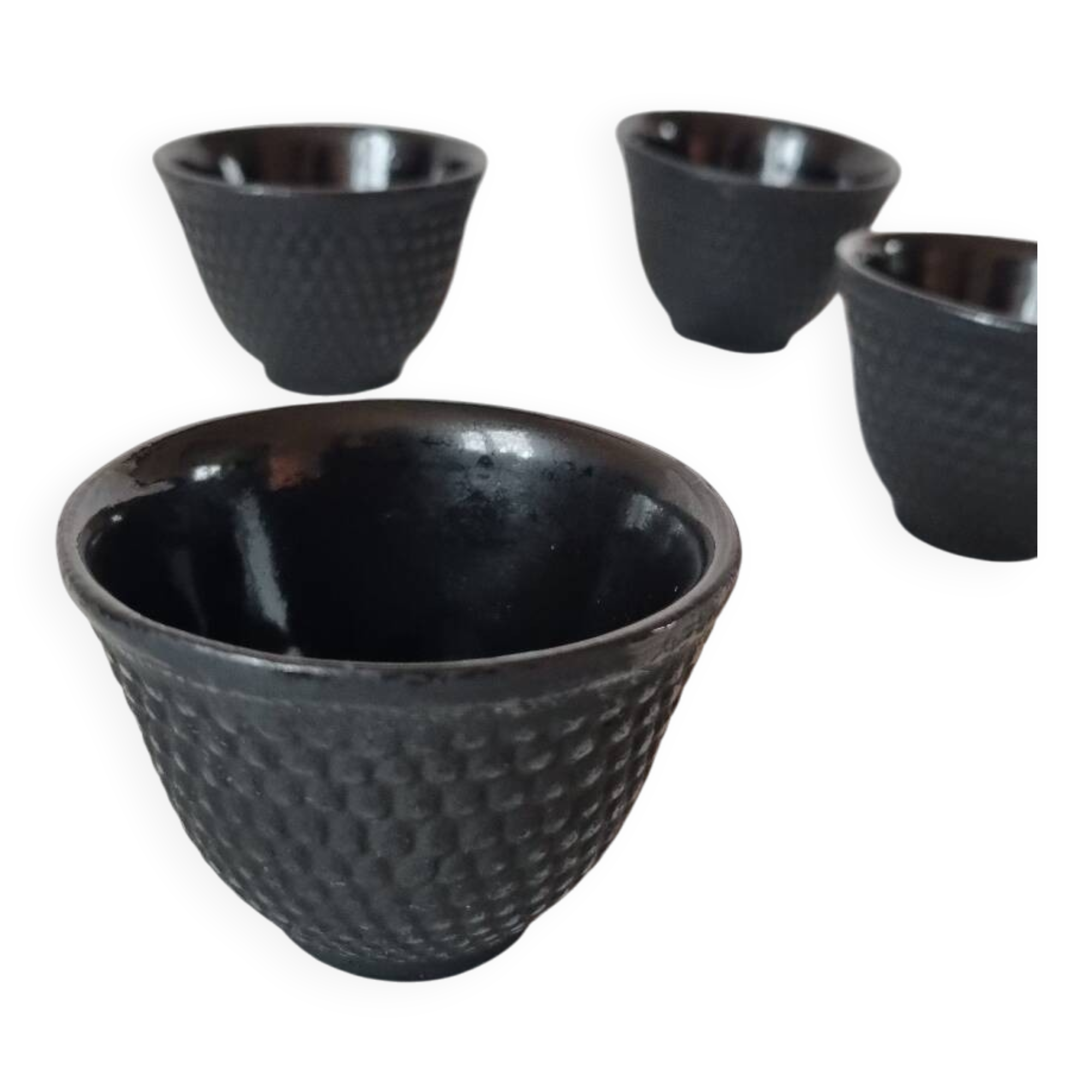 4 black cast iron teacups