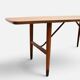 Table basse Anton Kildeberg (attribuée), noyer et laiton, Danemark années 1950-60.