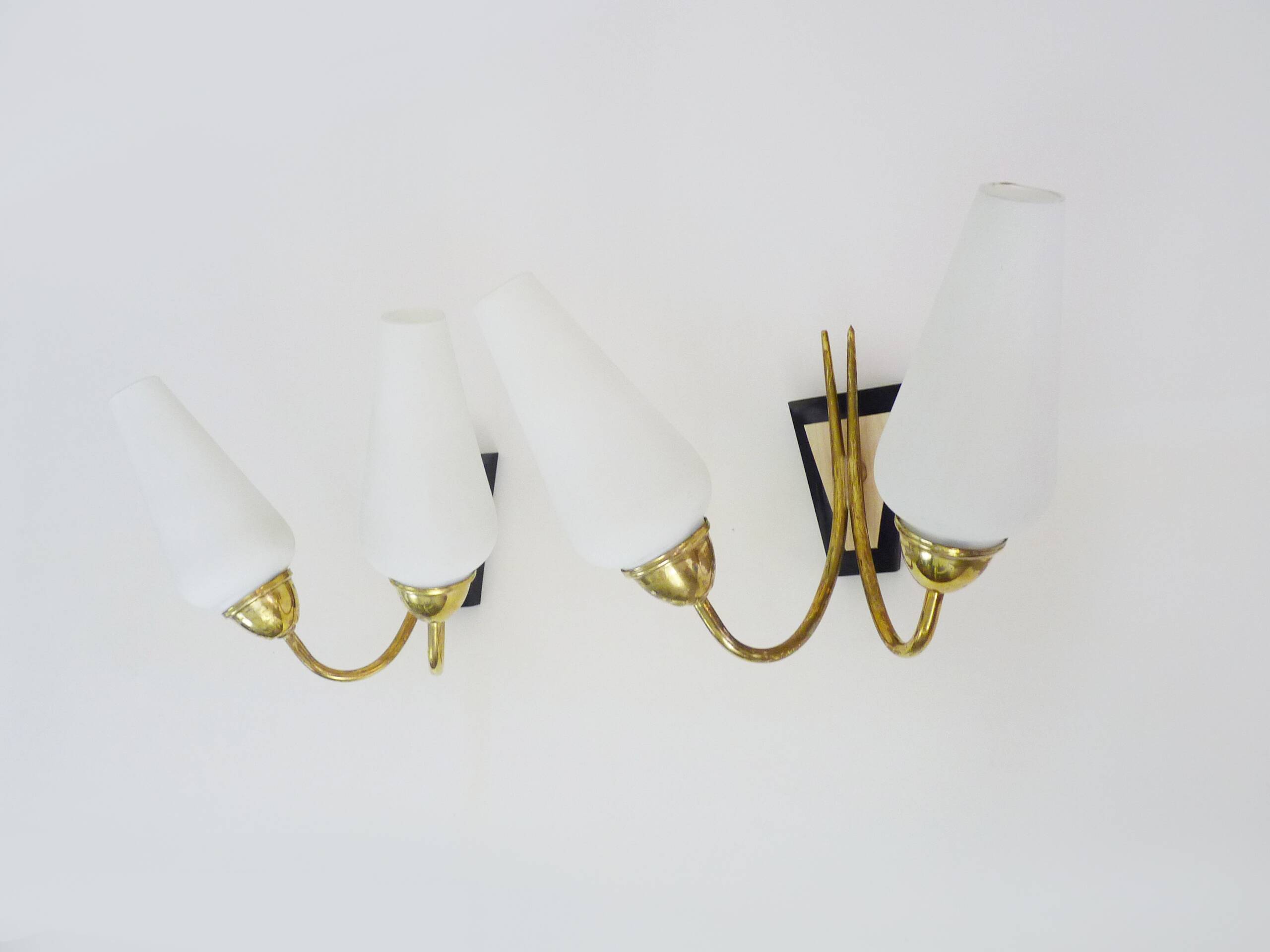 Pair of brass wall lights with double white tube lights. 70s