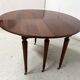 A six-foot Louis XVI style mahogany table from the 19th century.