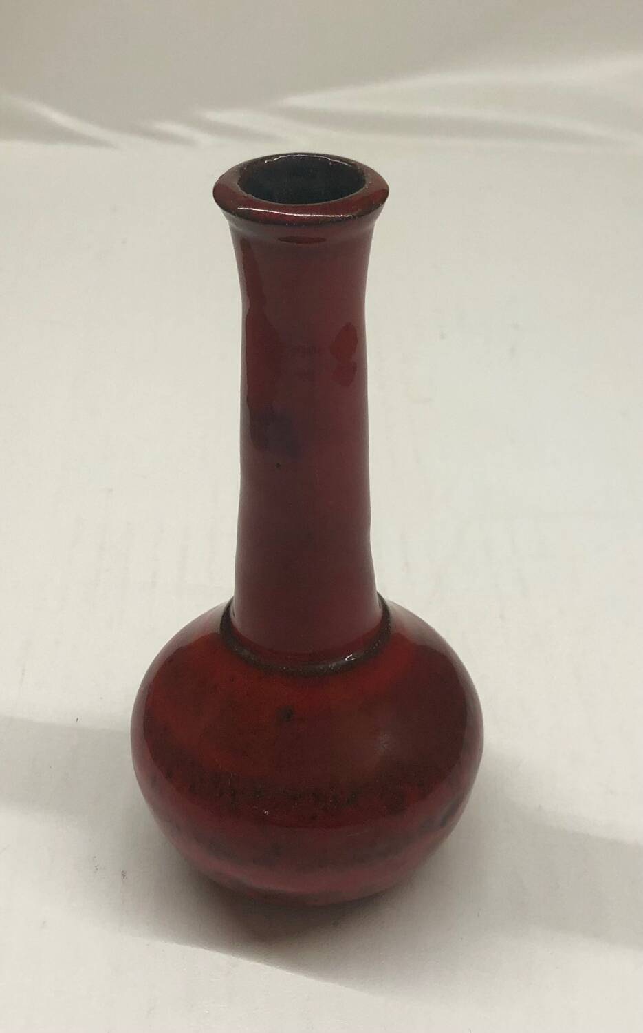 Red ceramic bud vase
