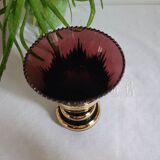 Flared vase in purple glass with a central gold motif