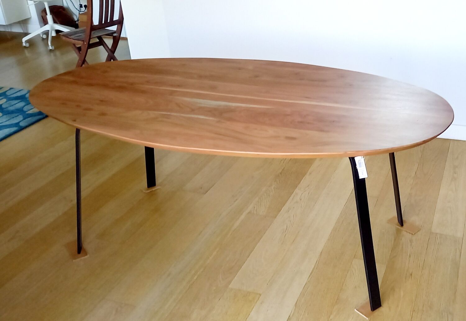 Oval solid wood and metal table