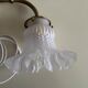 Antique gilded bronze wall lamp with frosted glass tulip