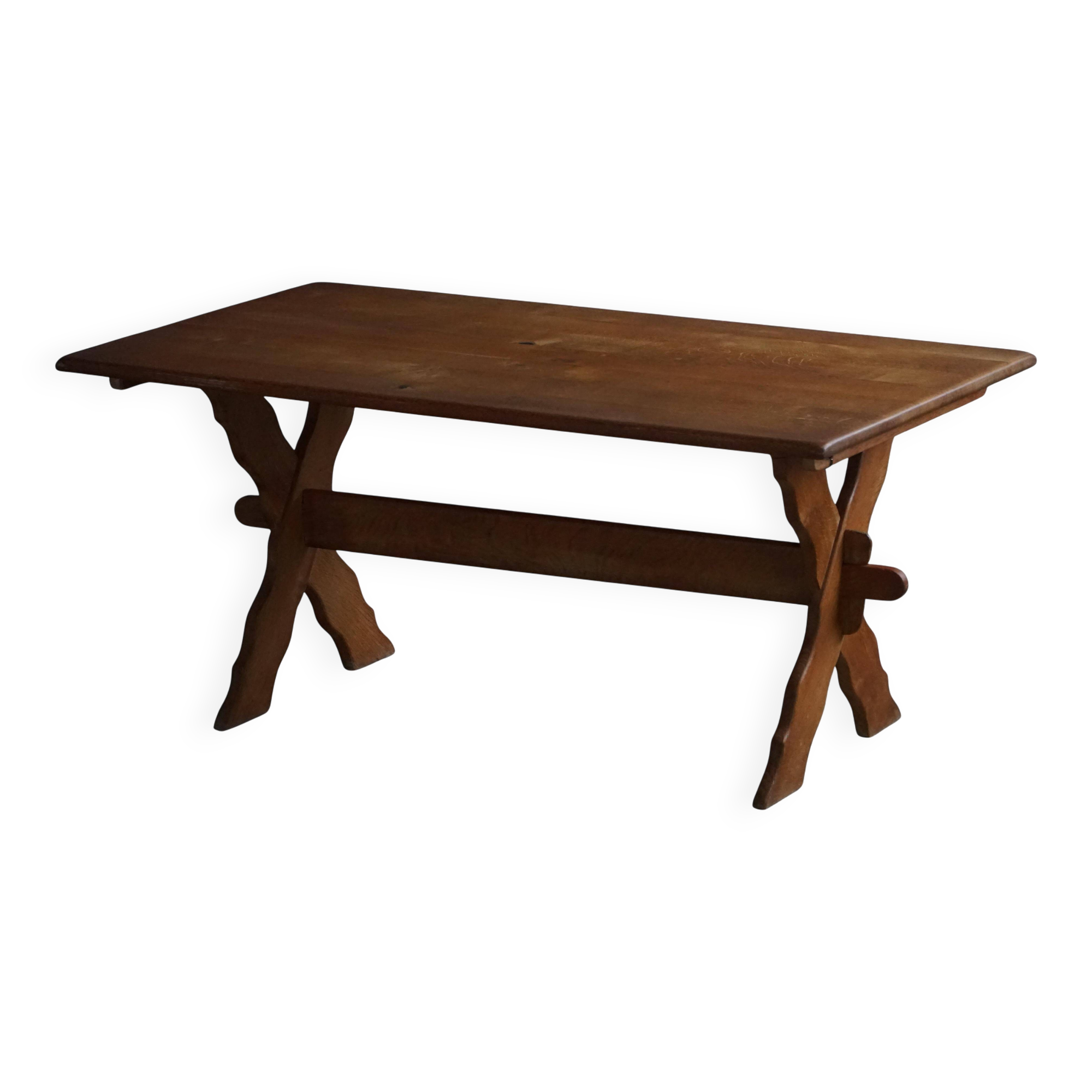 Solid oak dining table with cross base by Danish cabinetmaker, mid-20th century.