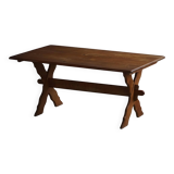 Solid oak dining table with cross base by Danish cabinetmaker, mid-20th century.