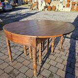 12-foot round oak table with 7 extensions / 20 people