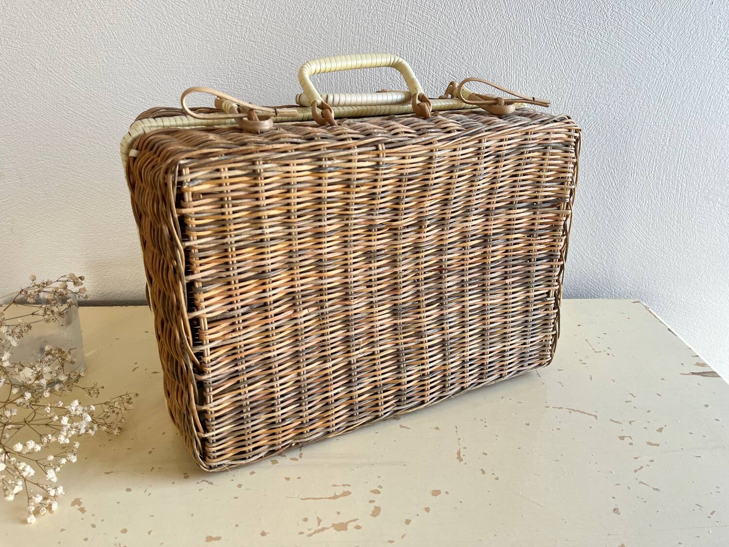 Vintage woven wicker suitcase