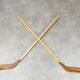 Pair of vintage wood hockey sticks