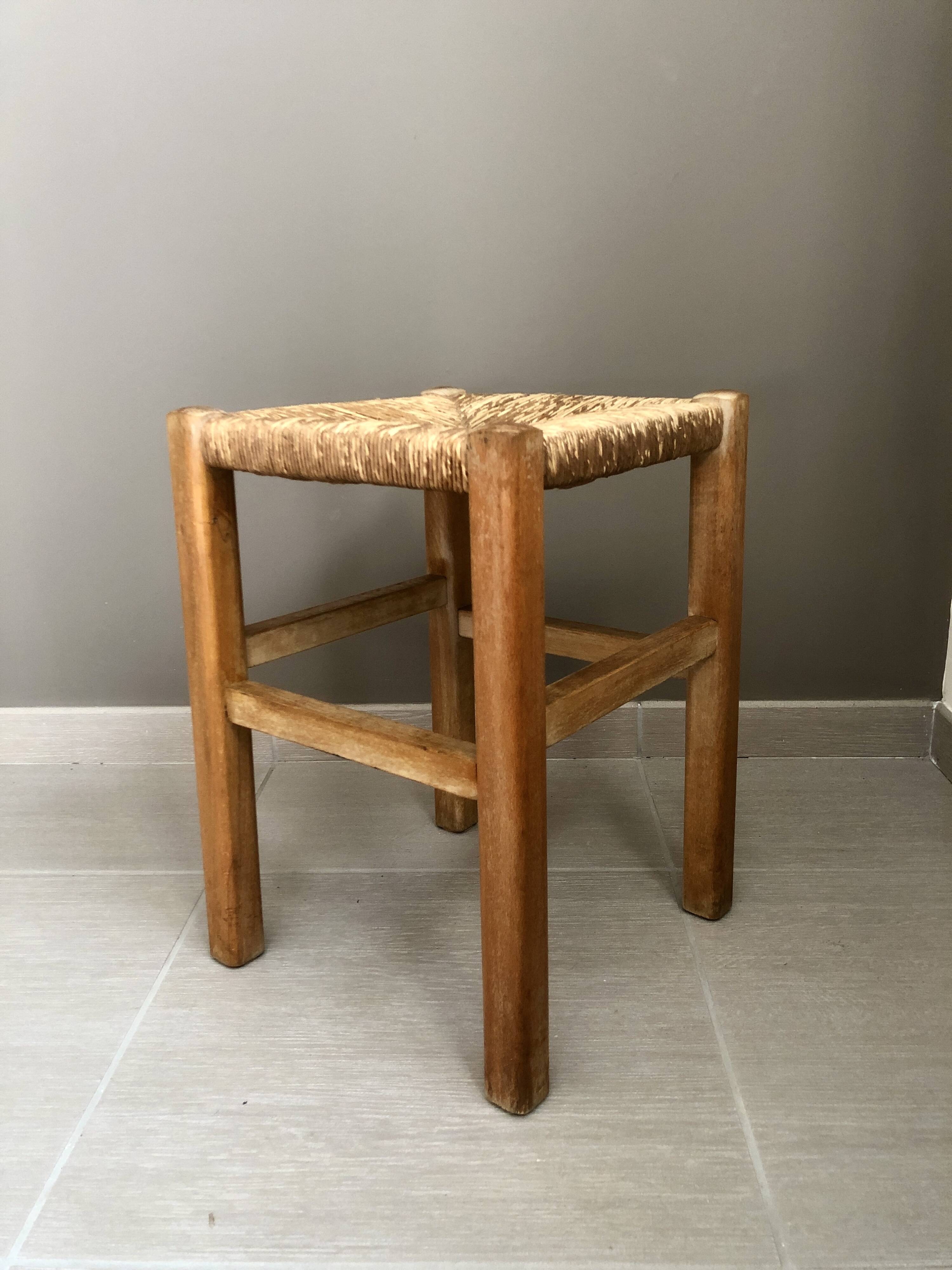 Wooden stool with straw seat