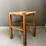 Wooden stool with straw seat