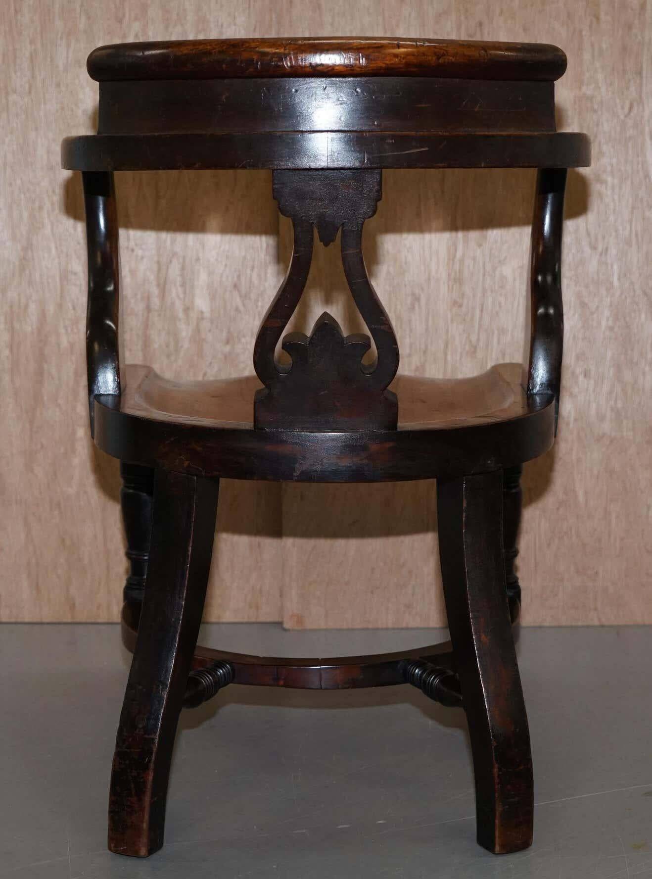Victorian captain's chair in walnut from Eton College