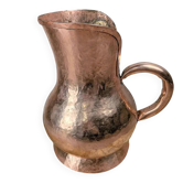 Antique hammered copper jug