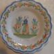 Two antique bowls signed HR from Quimper.