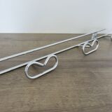 Large vintage wall-mounted coat rack in chrome metal