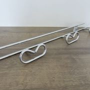 Large vintage wall-mounted coat rack in chrome metal