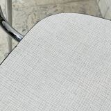 Set of two vintage grey Formica and chrome chairs.