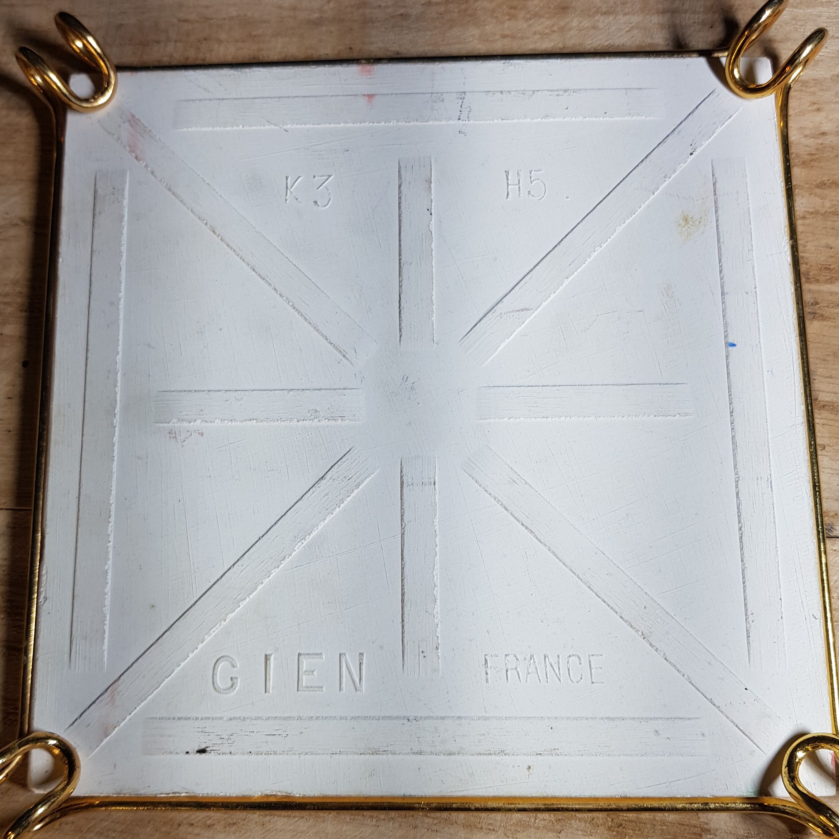 Pair of earthenware trivets