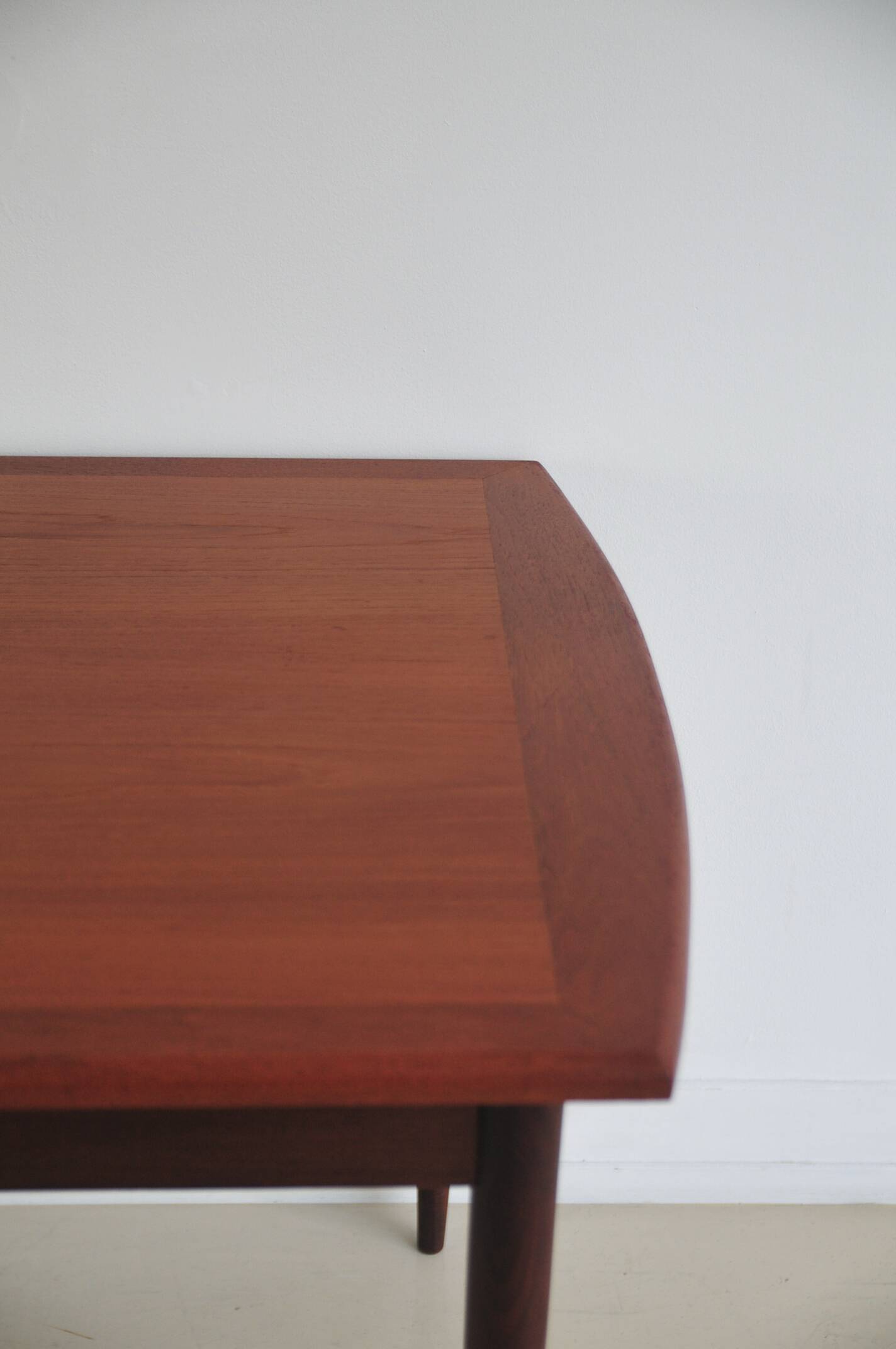 Folding teak dining table