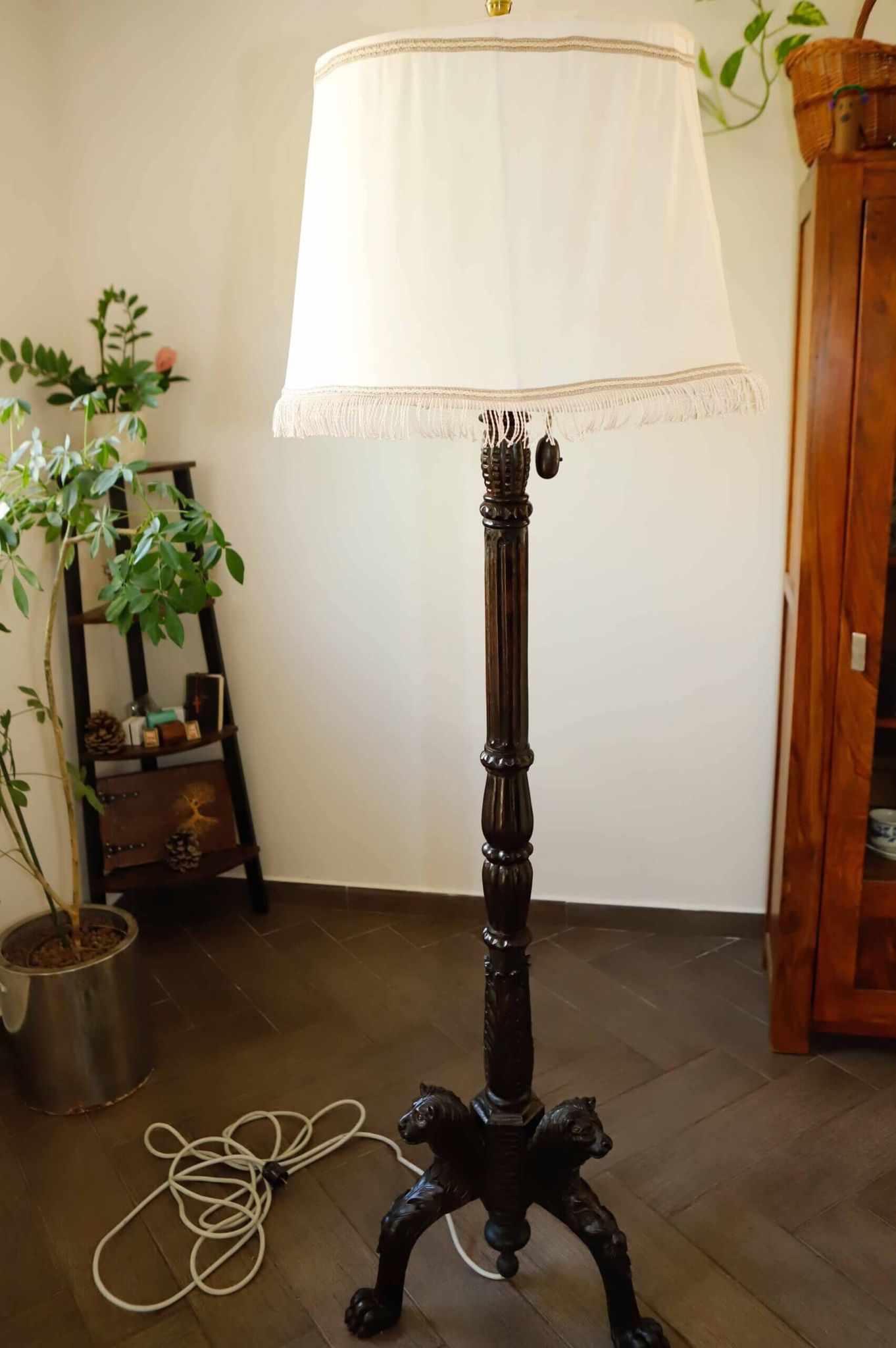Antique floor lamp with lion motif