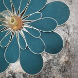 Peacock blue rattan and linen 24 petal flower wall light