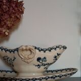 Old gravy boat on frame in terre de fer earthenware by gien, “chardons” model in blue-green