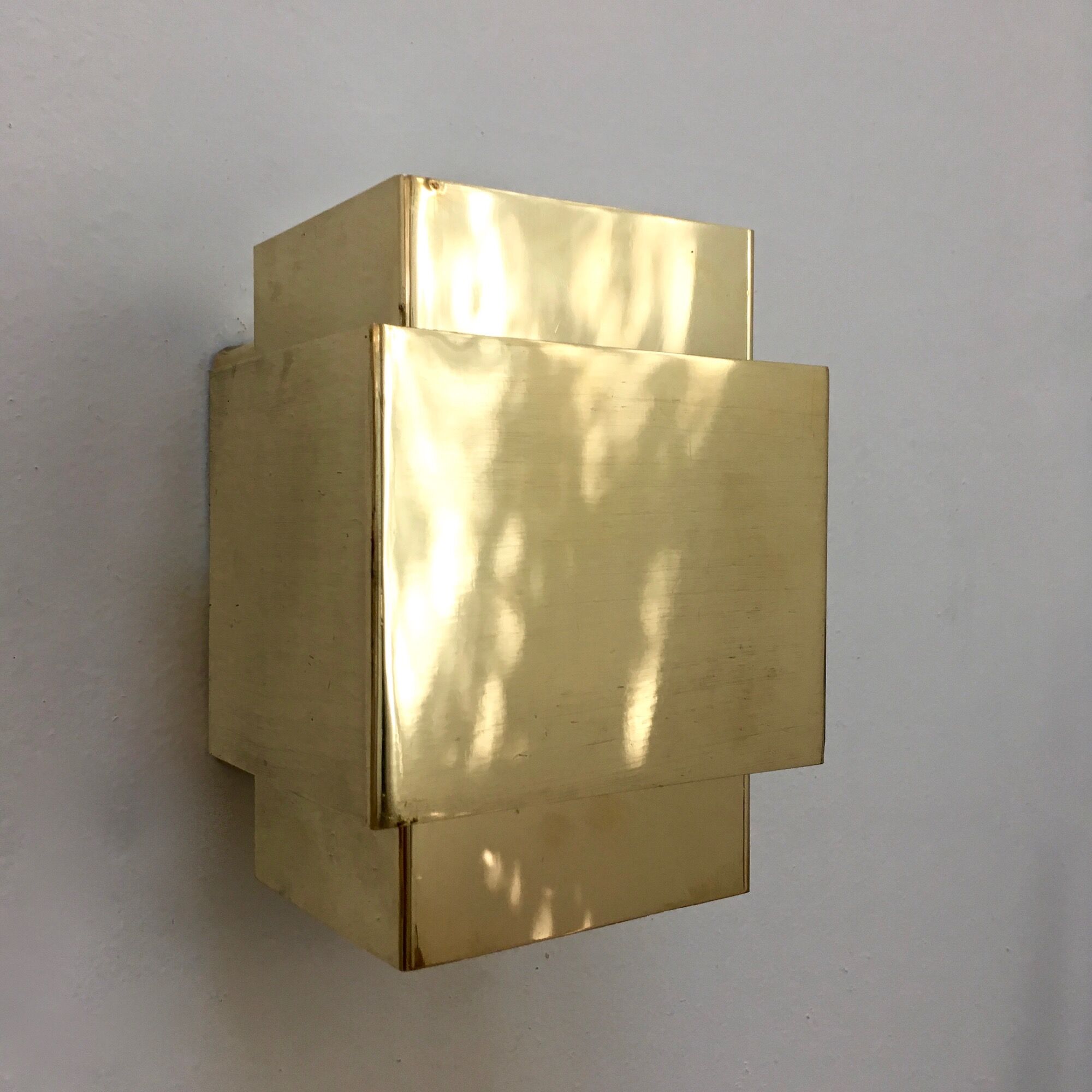 Polished brass cubic wall lamp circa 1960