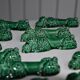 12 green earthenware knife rests