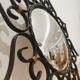 Witch mirror wrought iron and vintage brass