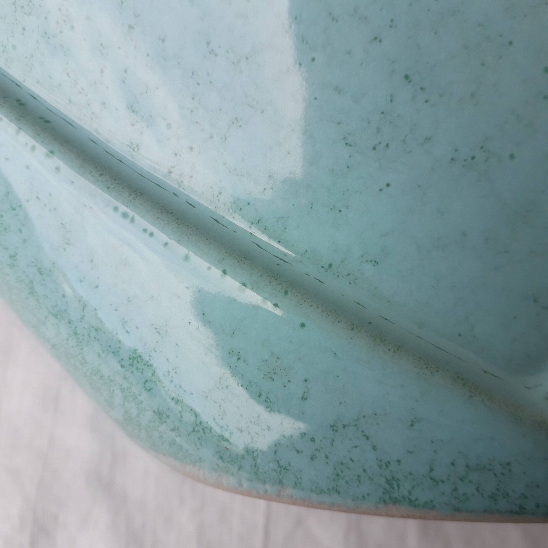 Triangular ceramic vase