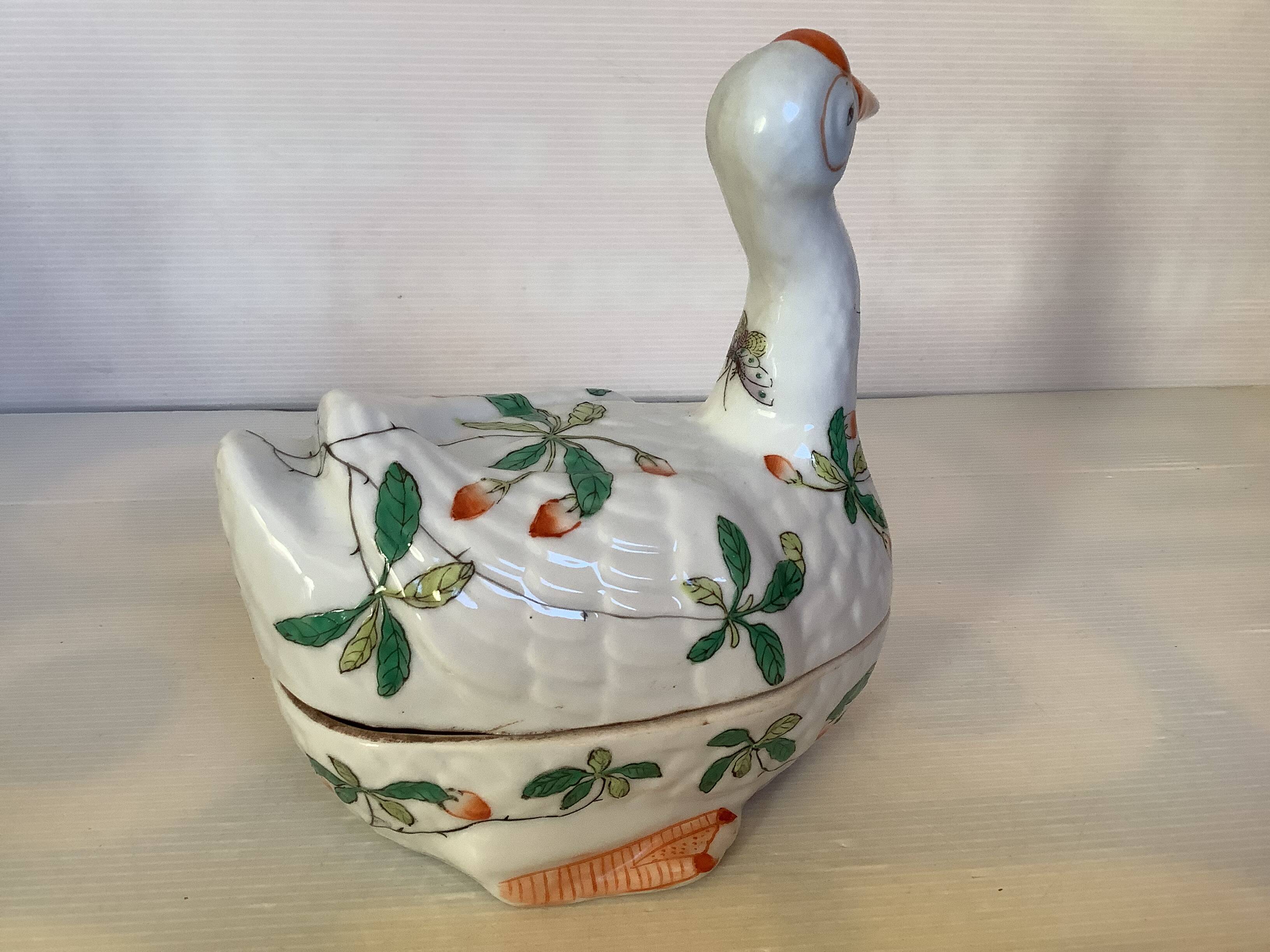 Large bird pocket emptier with butterflies and flowers.