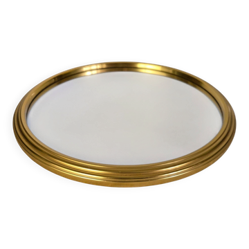 Round mirror tray in gold metal D.23